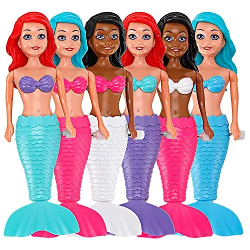 Wind-up mermaid bath toys swimming in water
